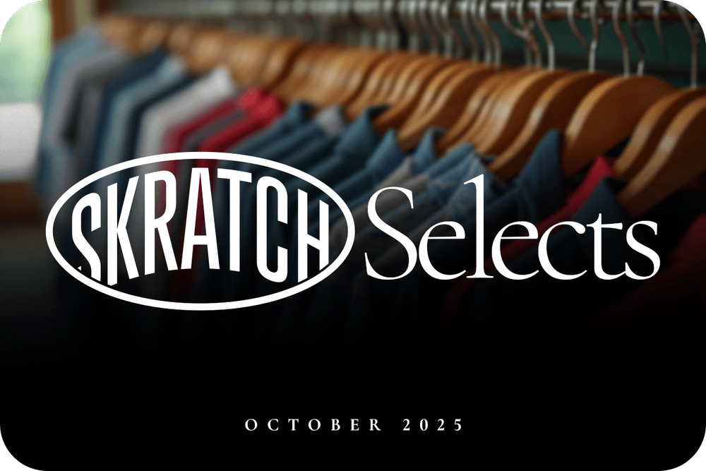 SKRATCH Selects logo over men's collared shirts hanging on wooden hangers.